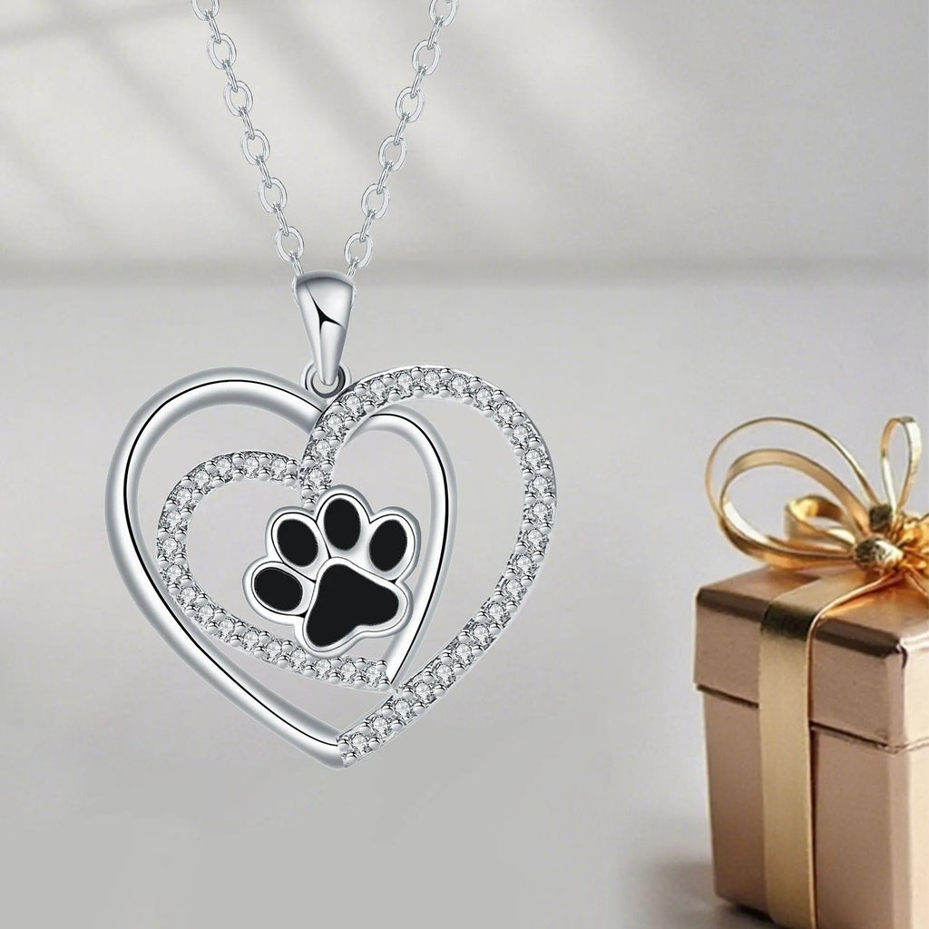 Women's necklace with a copper heart-shaped dog's paw pendant on a cross chain