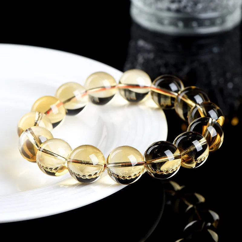 Natural citrine scattered bead bracelet showing original design with polished beads in varying arrangements