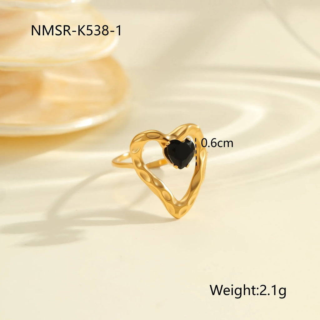Geometric women's adjustable ring with inlaid zircon on a titanium steel band.