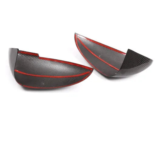 Pair of true carbon fibre rearview mirror covers for Porsche Macan, showing black woven texture.