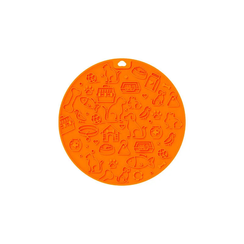 Round blue silicone pet licking mat for cats and dogs on a white background.