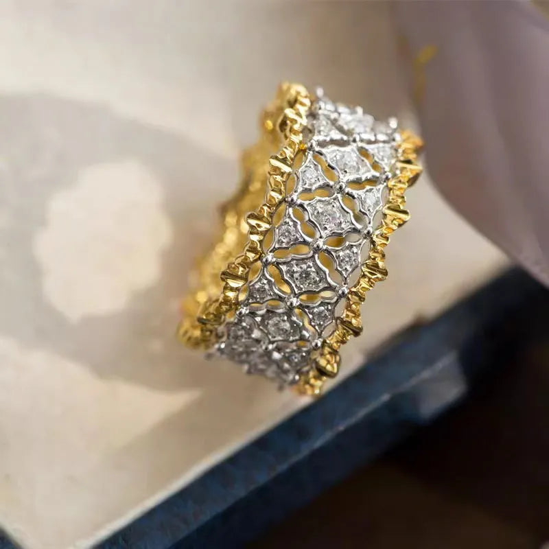 Geometric two-tone gold ring with round zircon detail on copper base