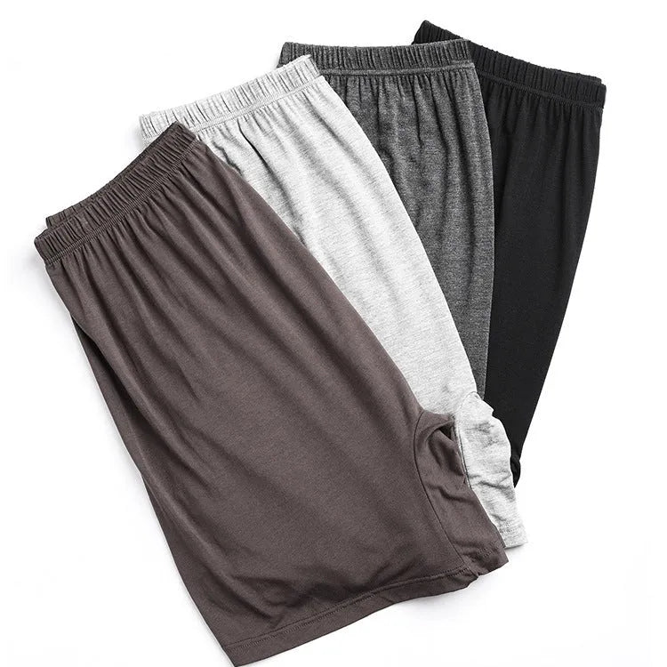 Men's solid colour high-waist boxer shorts in modal fabric, shown in black, on a plain background.