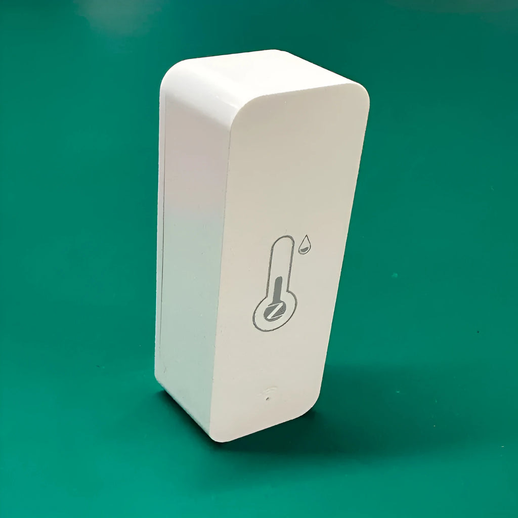 Compact white ABS plastic WiFi temperature and humidity sensor with measurement display