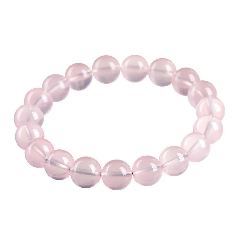 Women's crystal bracelet with polished round beads in pink starlight crystal, available in multiple bead sizes