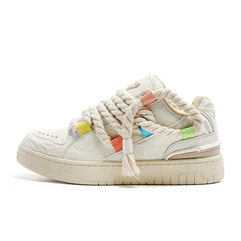Creamy white retro skateboard shoes with vintage lace styling and low-top design