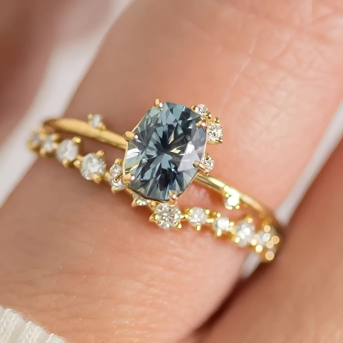 Gold electroplated women's ring with floral design and green zircon stone inlays on alloy base