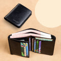 Men's leather organiser wallet open to show internal compartments including card slots and a zipped coin pocket.