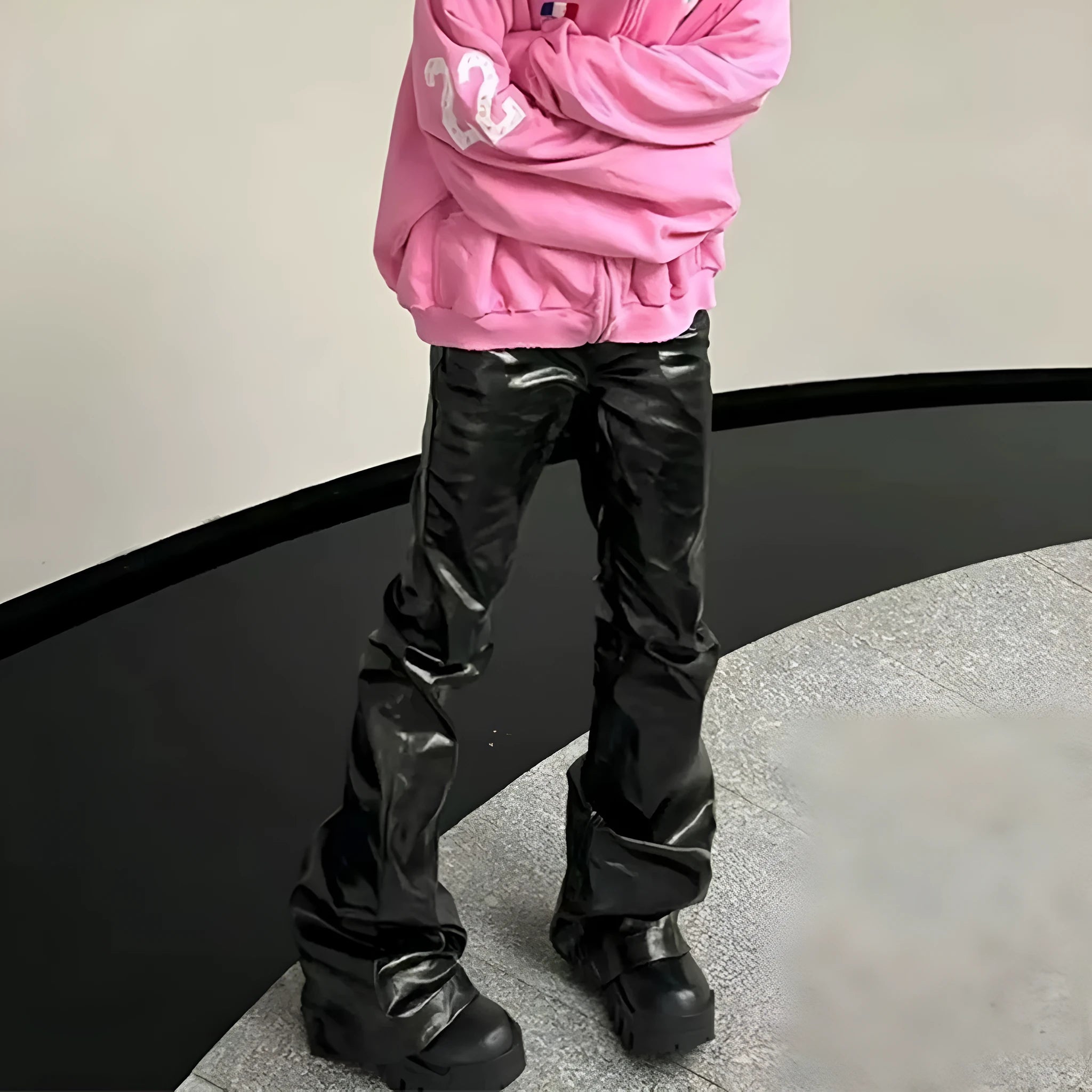 Black coated patent leather straight-leg jeans with shiny finish and cotton denim construction