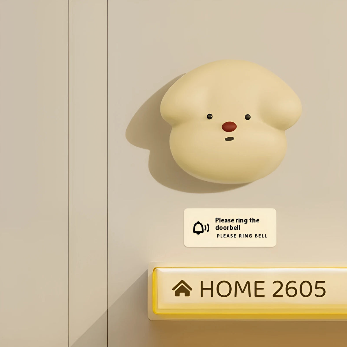 Household wireless plug-in doorbell in milky yellow or white colour