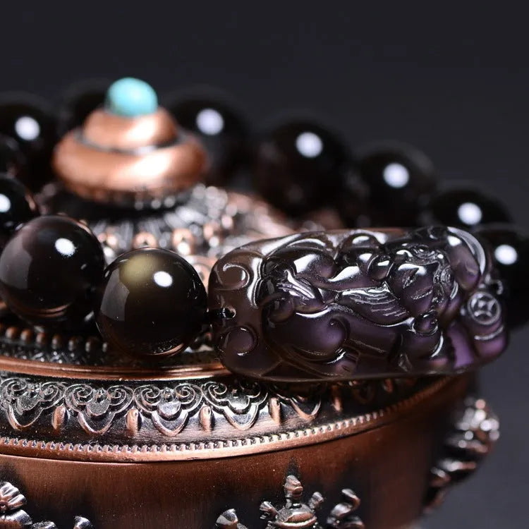Natural crystal Pi Xiu bracelet with geometric ethnic design in ice stone colours