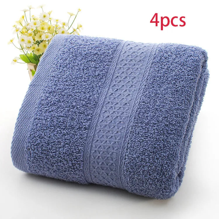 Thickened cotton blend bath and beach towel shown in multiple colour options including green, blue, and pink variations.