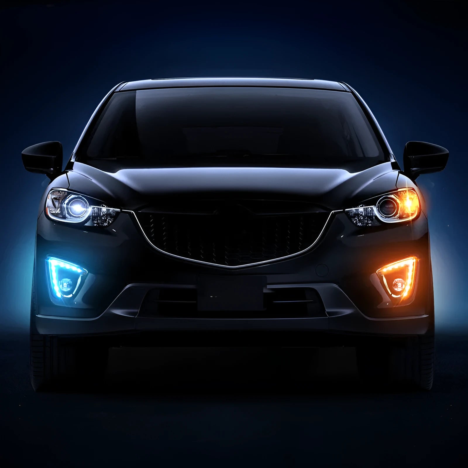 Pair of electroplated Mazda CX-5 daytime running light LED bulbs on a white background.