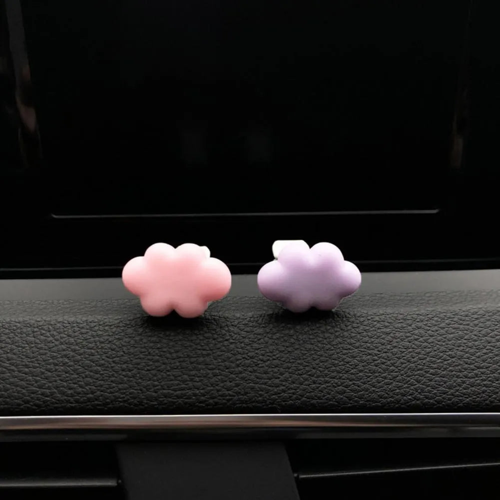 Resin car fragrance clip with Baiyun cartoon cloud design mounted on car air vent