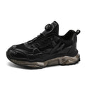 Men's black rotating button casual sneakers with mesh upper and low platform sole.