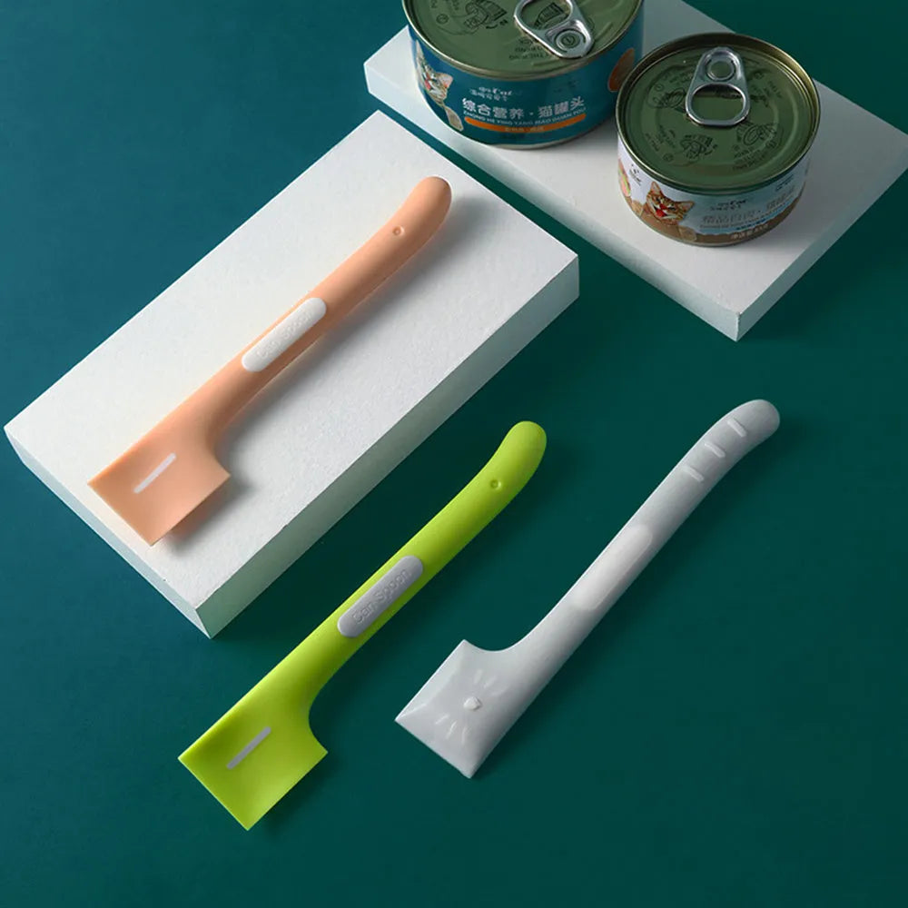 Green, pink, and purple long-handled pet food scoop for canned cat and dog food
