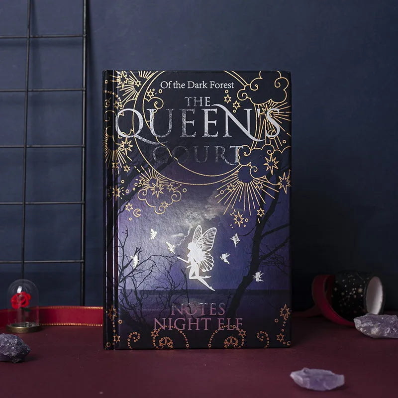 Blue and purple A5 hardcover luminous notebooks open to show full-colour illustrated pages.