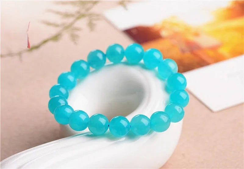 Natural Grade 7A Amazonite scattered beads showing 5A Ice and 7A Ice colour options in various sizes from 6mm to 13mm.