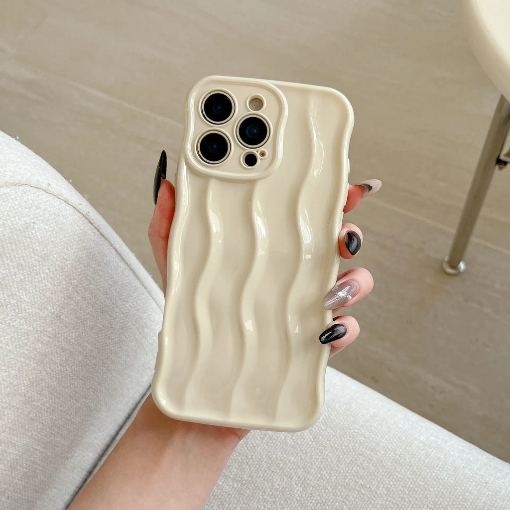 Electroplated wave stripe design on a flexible TPU iPhone 17 protective case in silver finish.