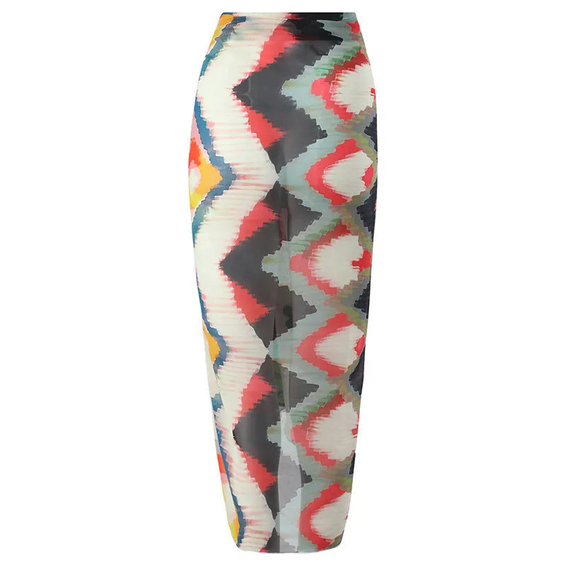 Women's two-piece striped swimsuit with a matching gradient print hip skirt laid flat.