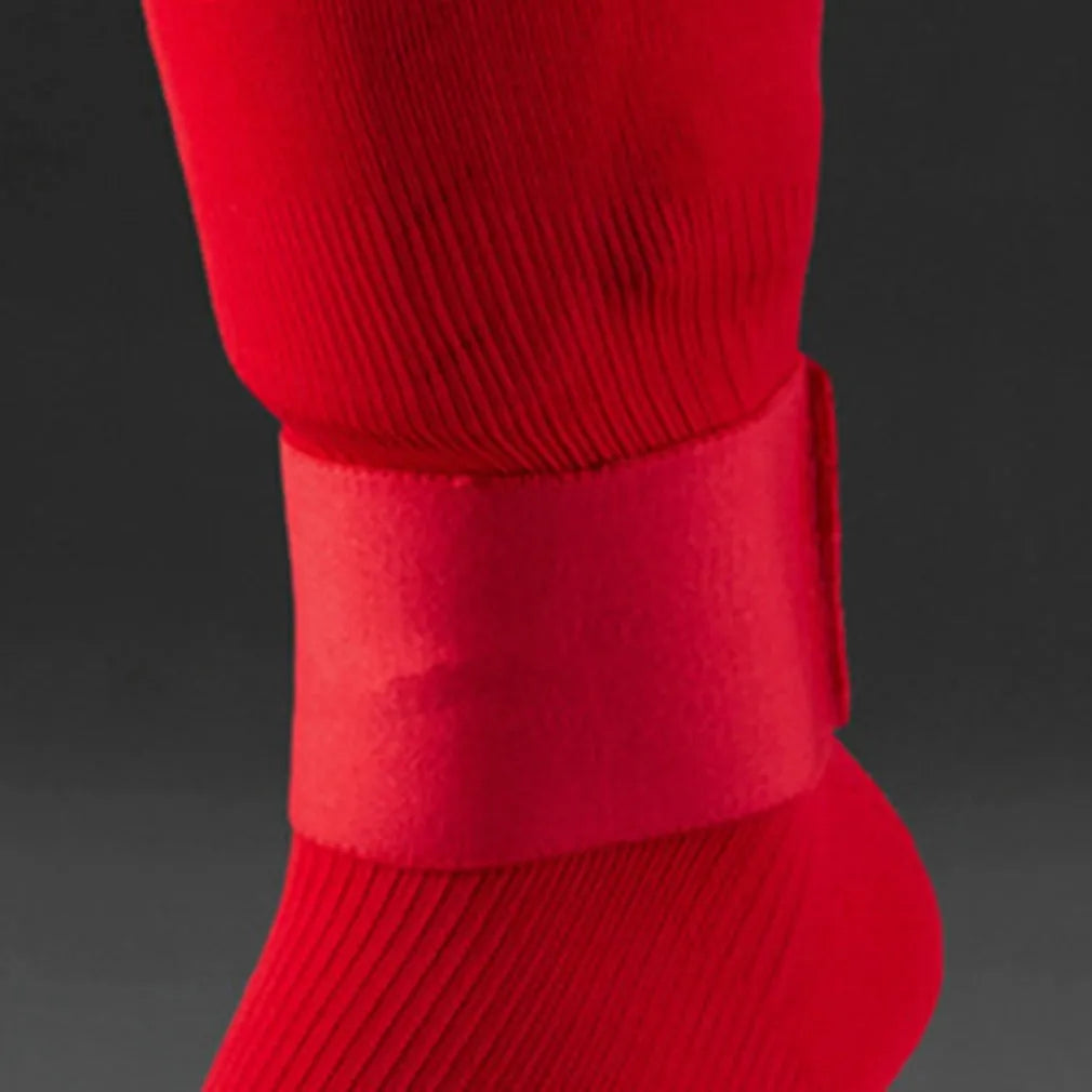 Rubber football shin guard magic tape belt in four colours measuring 25cm by 6.5cm