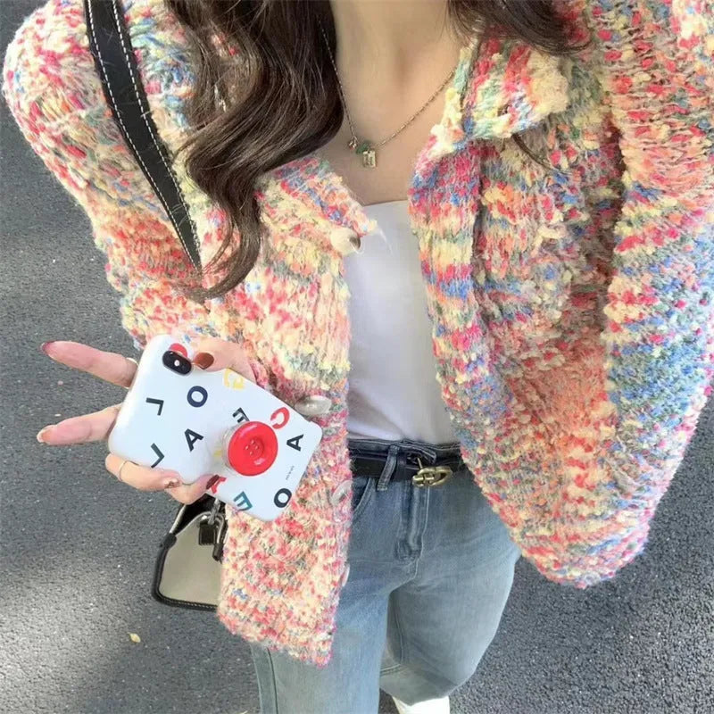 Retro style knitted rainbow cardigan sweater in pink or green colour with toothbrush hair fabric texture