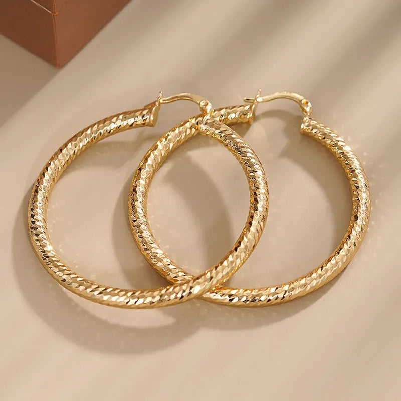 Women's geometric ring and line design ear clip earrings in electroplated copper
