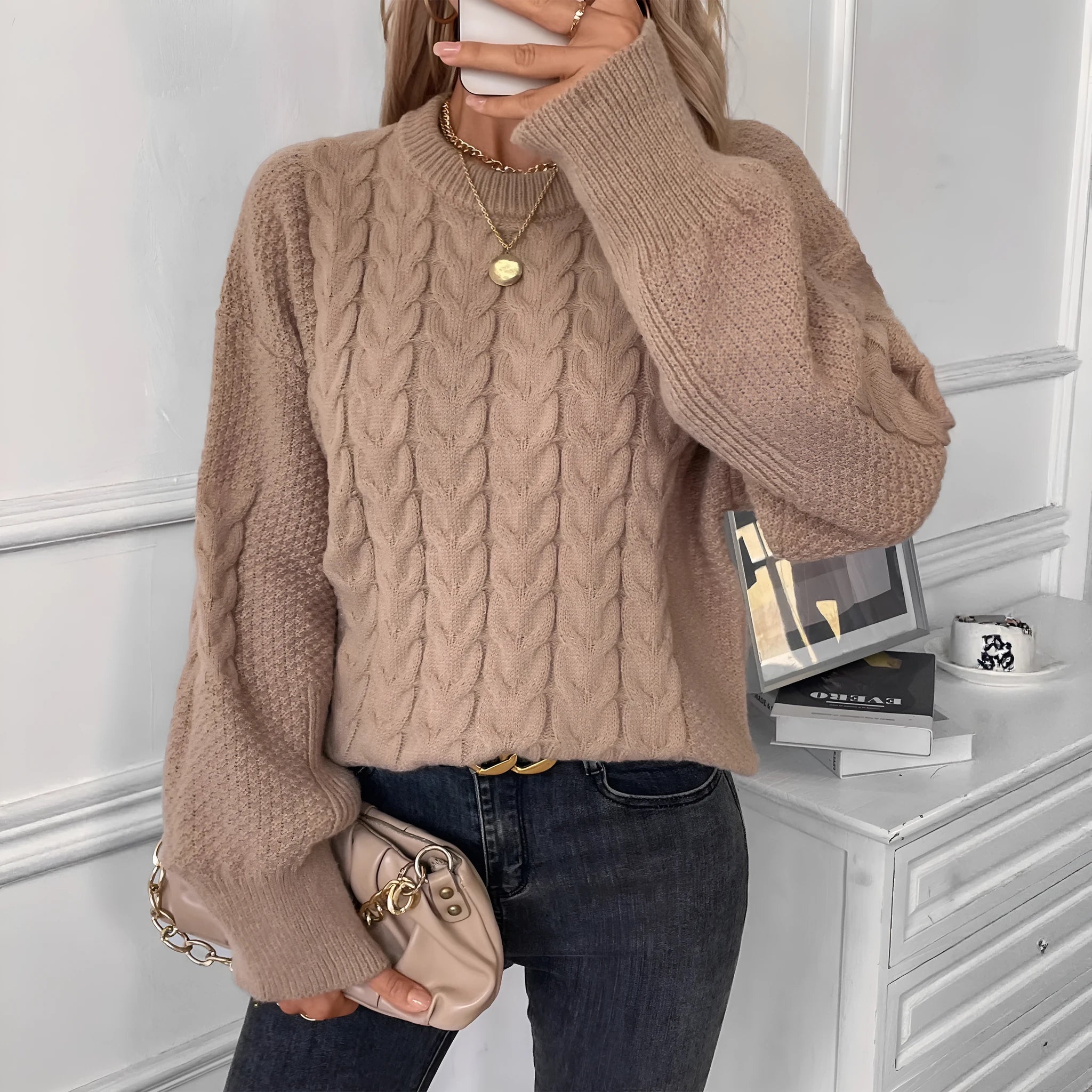Women's beige round neck casual polyester sweater with loose fit on hanger