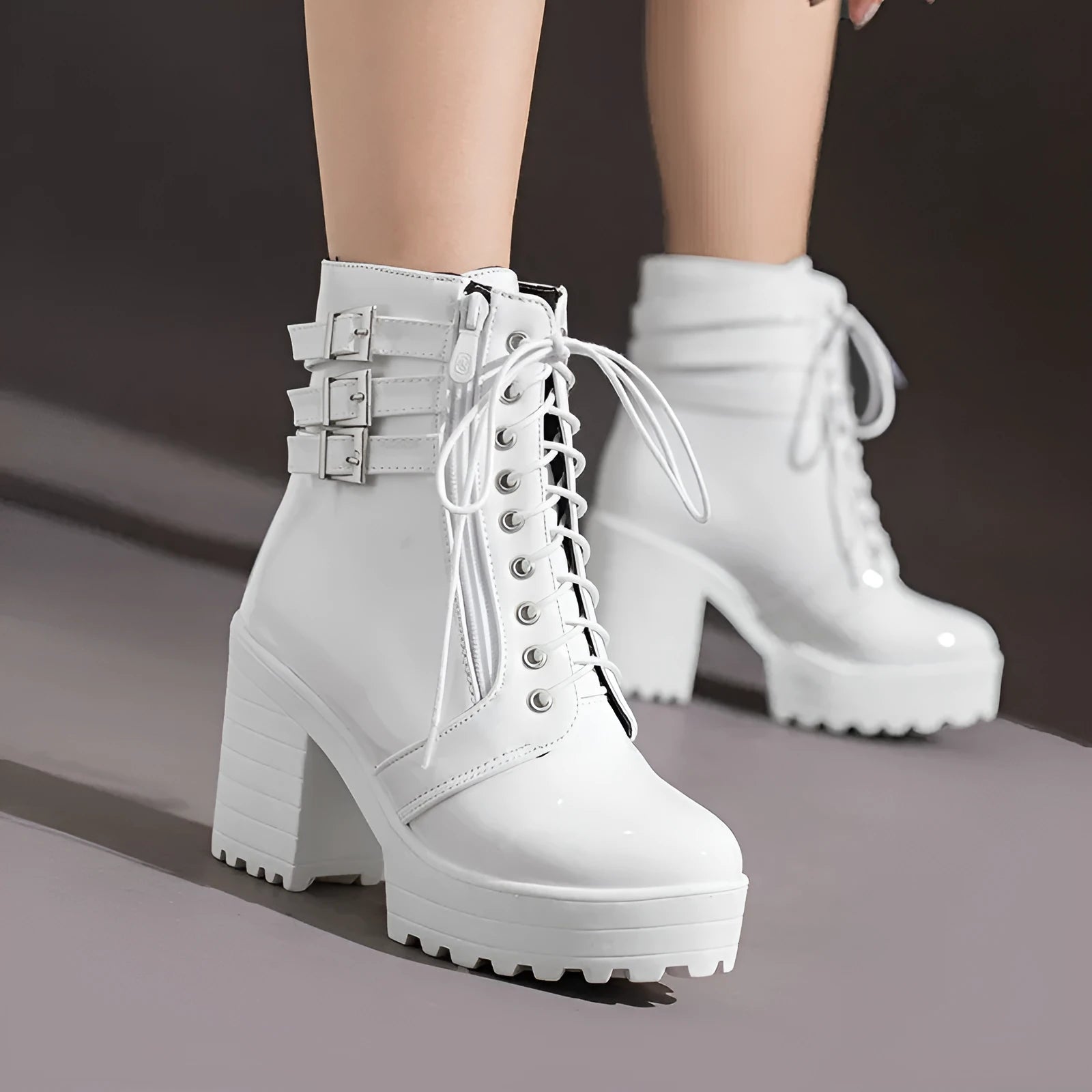 Women's black ankle boots with 6-8cm heel, waterproof platform, and front lace-up design