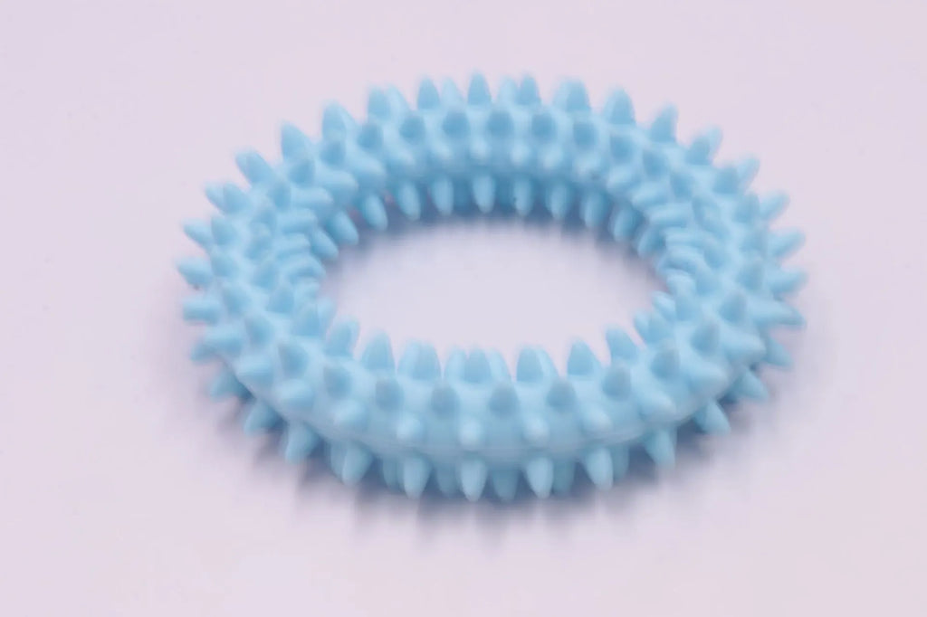 9.5cm diameter TPR dog chew toy with spiked dental cleaning nubs in multiple colours