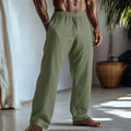 Straight-leg cotton linen casual trousers in light green colour, showing five-pocket design.