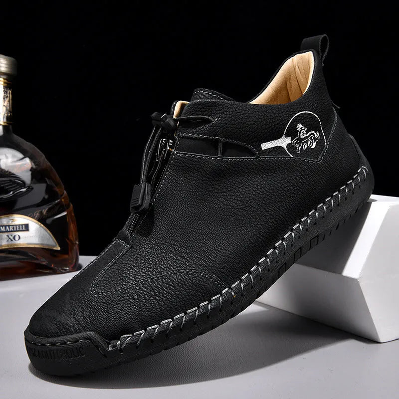 Men's black casual leather shoes with a round toe, rubber sole, and mid-height heel.
