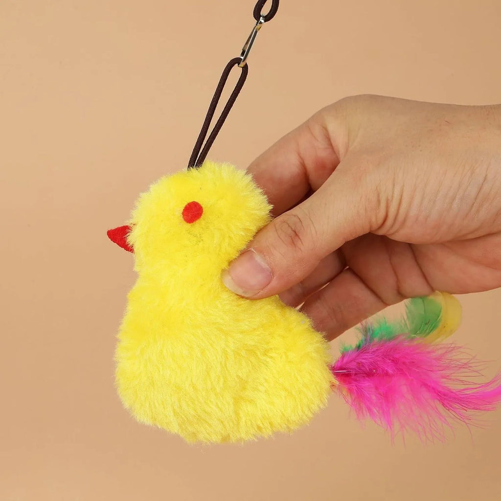 Interactive cat toy hanging on door frame with elastic rope, dangling mouse toy, and treat reward bulb