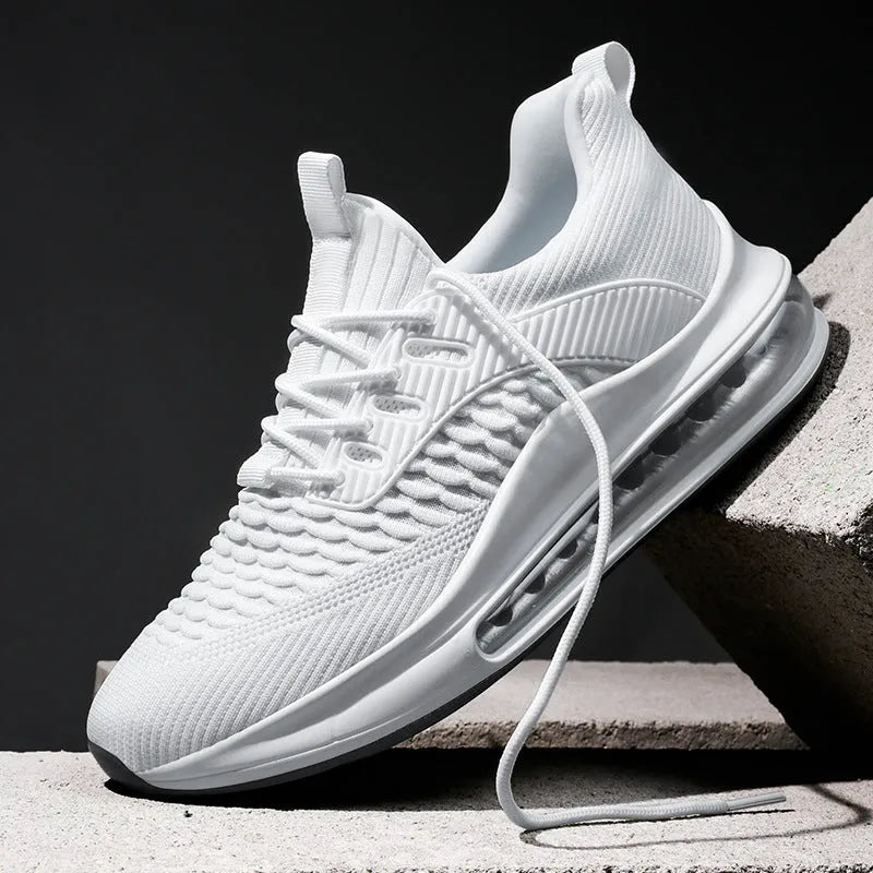 Men's low-top black mesh running sneakers with rubber sole and lace-up front, shown on a white background.