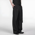 Black straight-leg trousers with a single pleat and adjustable waistband, laid flat.