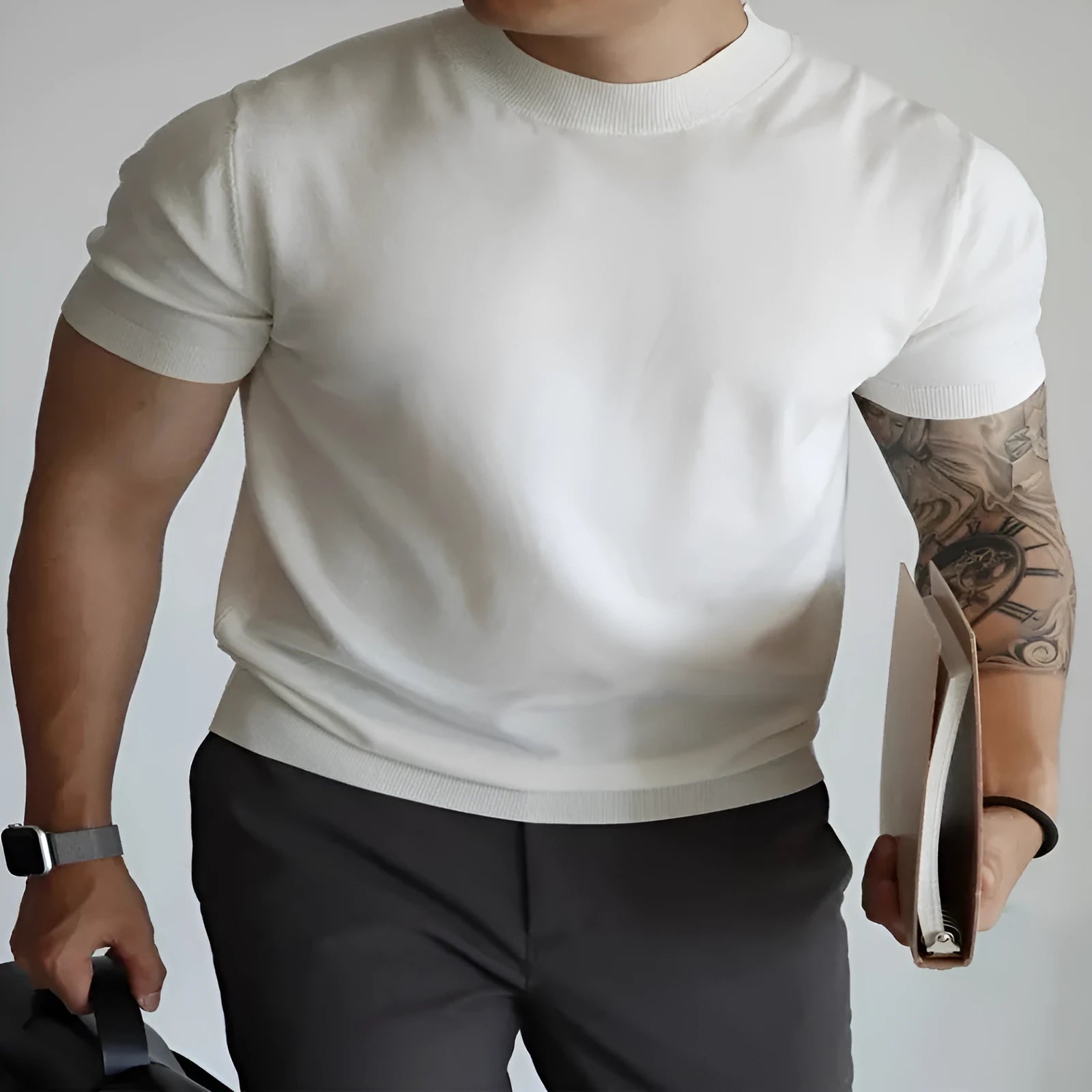 Men's slim-fit short sleeve t-shirt in thin polyester knit, shown in a solid colour.