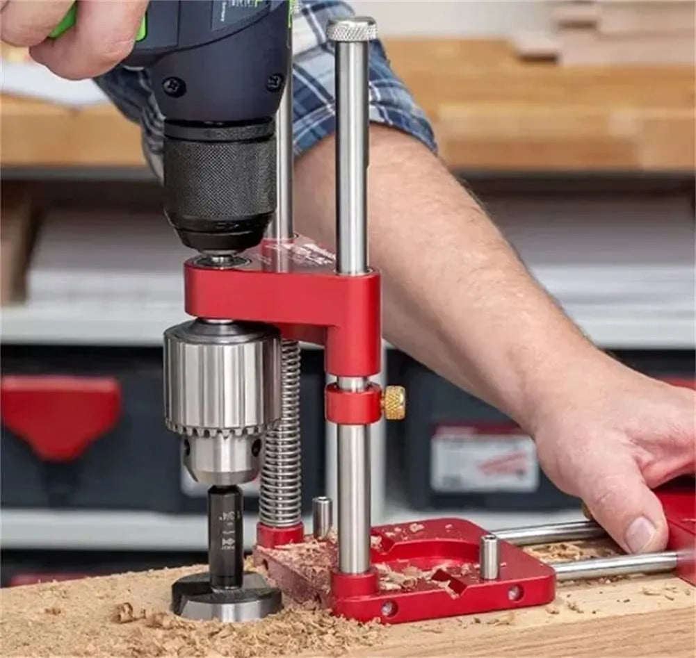 Woodworking drill locator with metal body and red or black durable polymer section for wood drilling