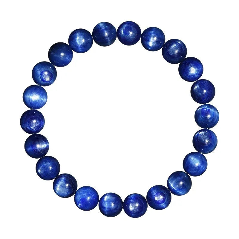 Natural blue crystal geometry ball bracelet with Ruyi charm on a white background.
