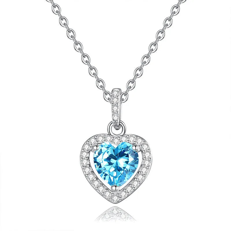 Sterling silver necklace with heart-shaped natural gemstone pendant on adjustable cross chain