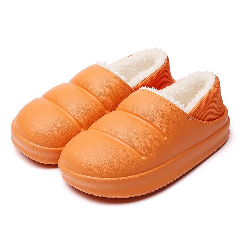 Waterproof EVA garden slippers in green with a plush lining and non-slip sole.