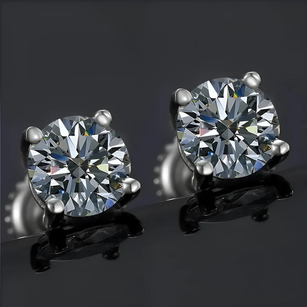 Silver moissanite stud earrings with four-claw geometric setting and 7mm width showing included certificate and tools