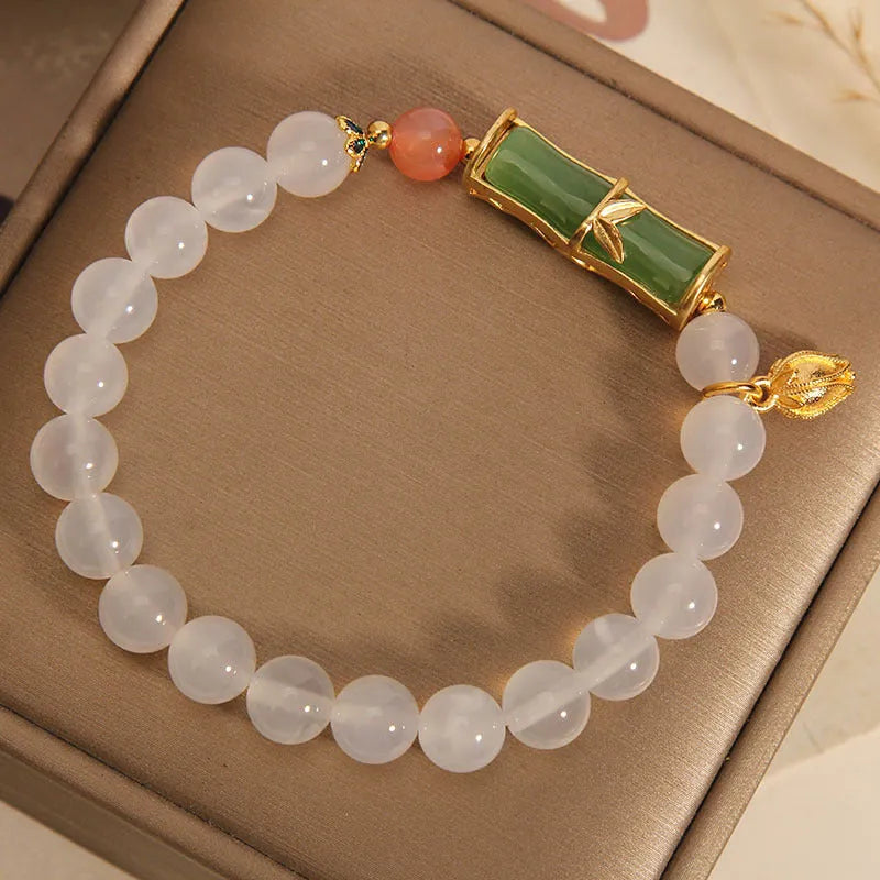 White agate and jade Chinese style bamboo beaded bracelet for women with retro luxury design