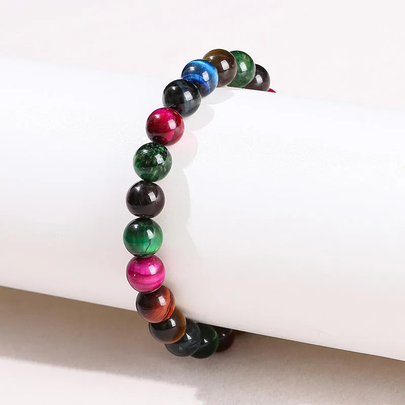 Geometric colourful Tiger Eye gemstone bracelet showing mixed natural colours on a string, available in multiple bead sizes.