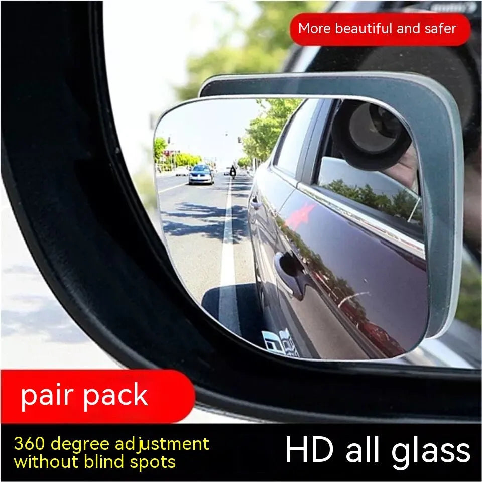 A pair of white, fan-shaped car blind spot mirrors with a 360-degree adjustable mounting bracket.