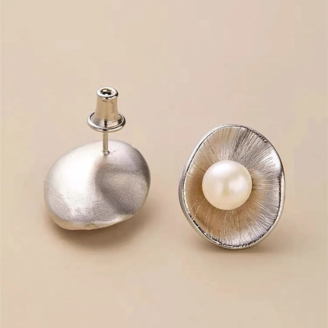 Geometric sterling silver ear studs with pearl elements and electroplated gold finish