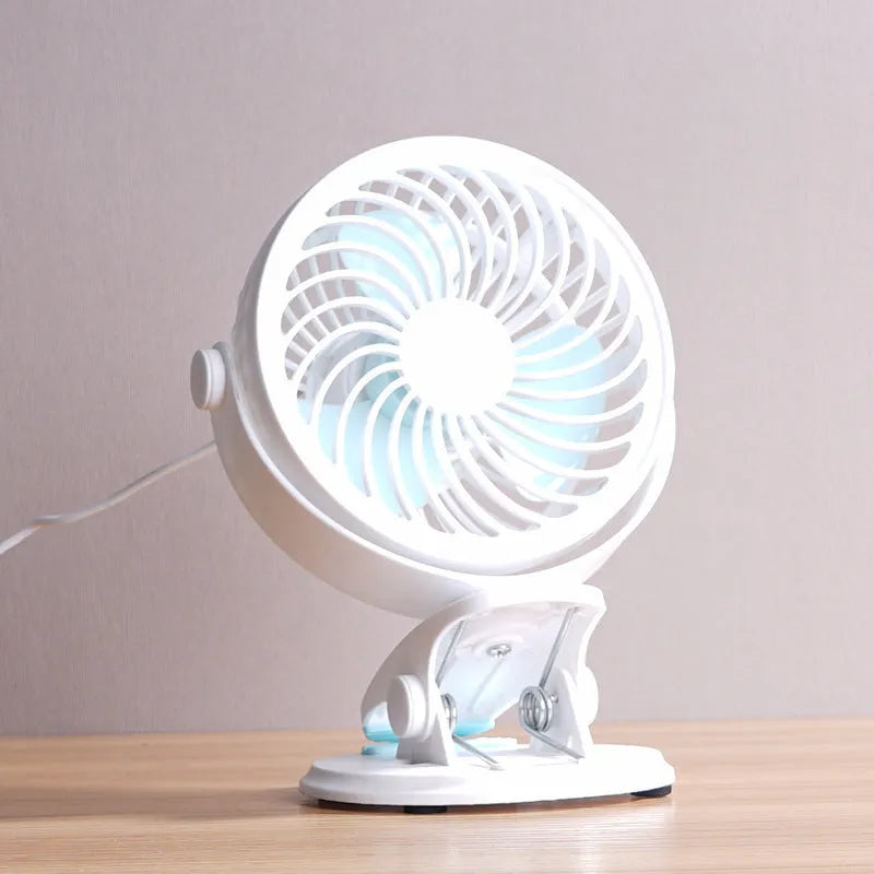 USB desktop fan with clip attachment showing compact 19x15x10cm design and three blades