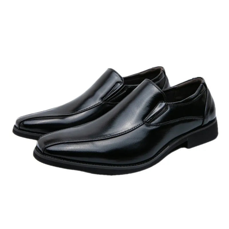 Men's black patent leather pointed toe casual shoes with a flat heel and totem design on a white background.
