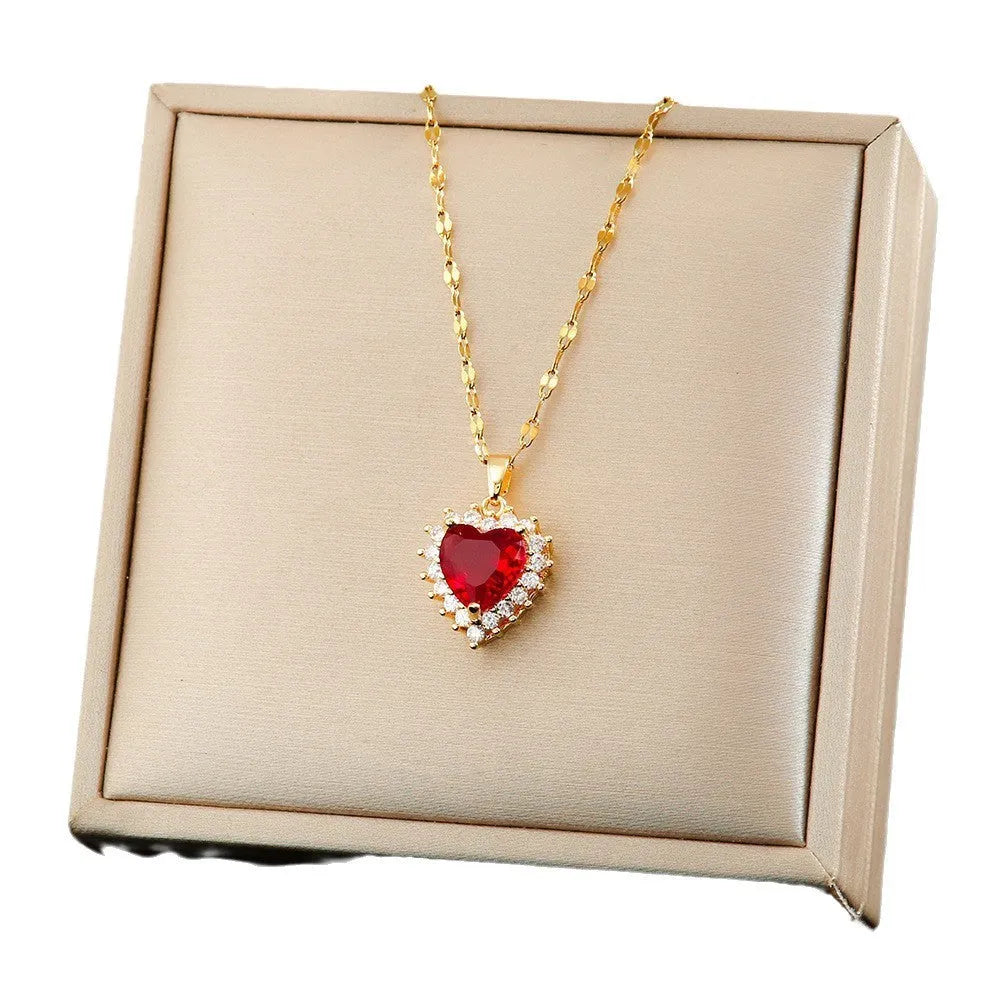 Gold-red electroplated heart jewellery set with mixed gemstone inlay on titanium steel necklace, earrings, and ring