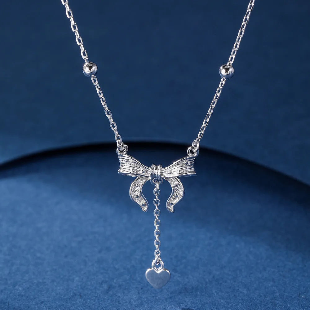 S925 silver butterfly heart and bow pendant necklace on adjustable O-ring chain
