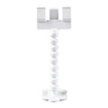 Black plastic pet photography tool with treat clip and phone holder, shown rotated to adjust angle.